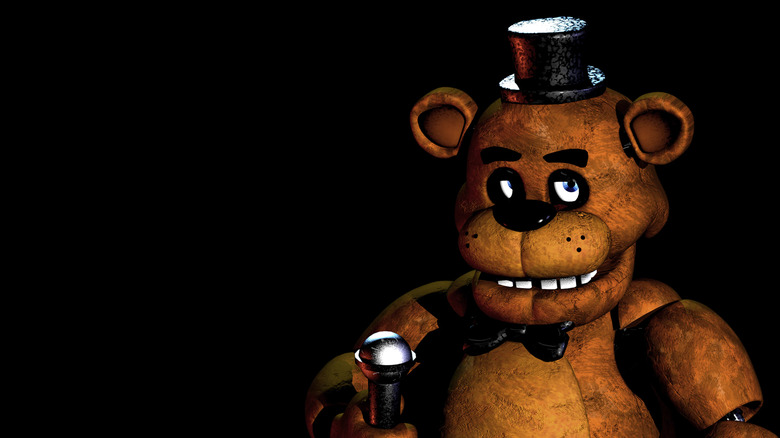 Freddy Fazbear creepily holding microphone