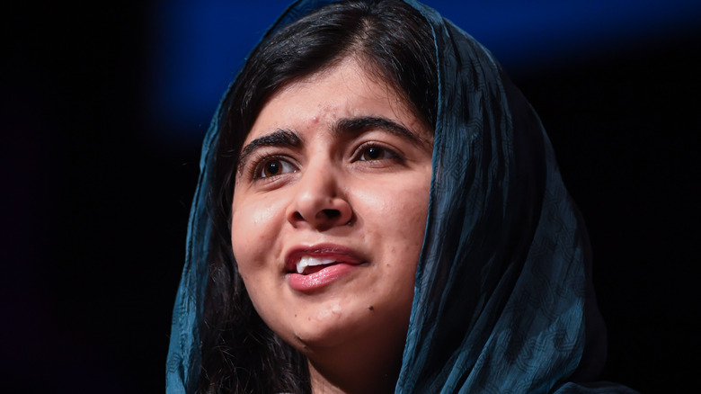 Malala speaking on stage