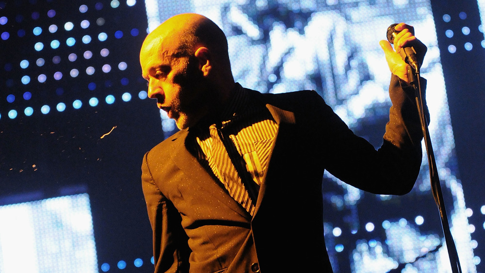 Michael Stipe of R.E.M. performing live