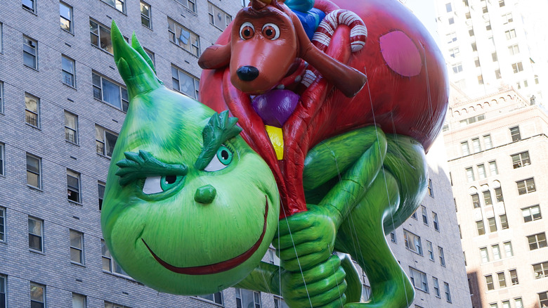 The Grinch and Max balloon at parade