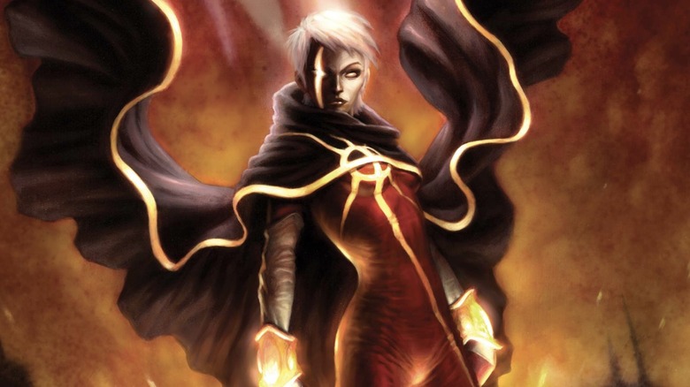 Phyla-Vell in front of red smoke