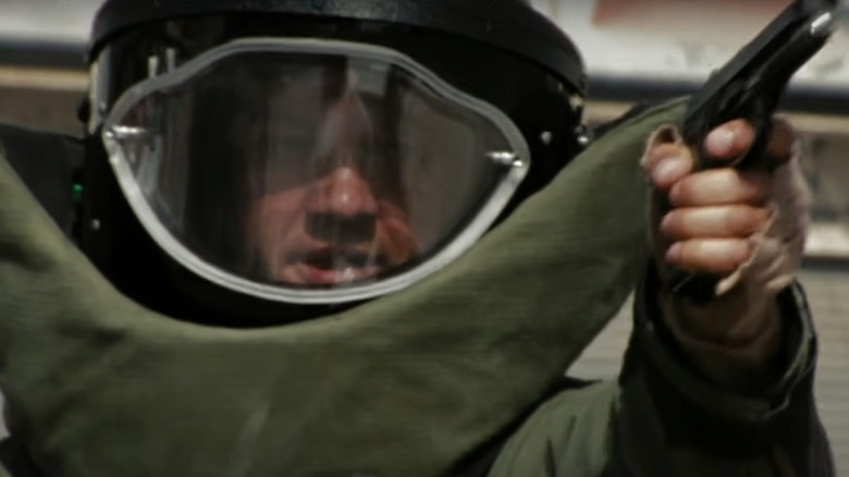 Jeremy Renner in bomb suit