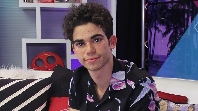 Cameron Boyce sitting