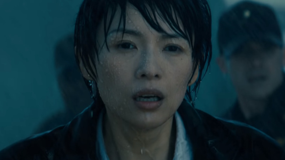 Dr. Chen in rain