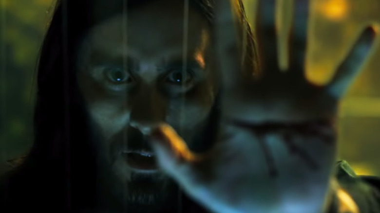 Jared Leto reaches out his hand Morbius