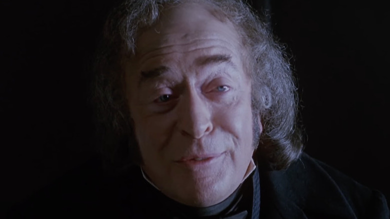 Michael Caine as Scrooge, speaking