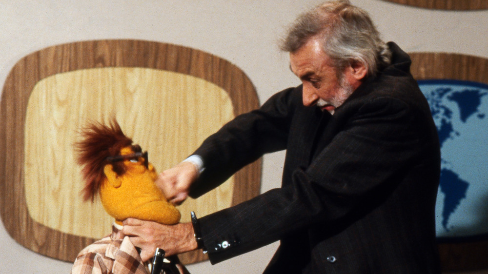 Spike Milligan fighting Muppet News Anchor