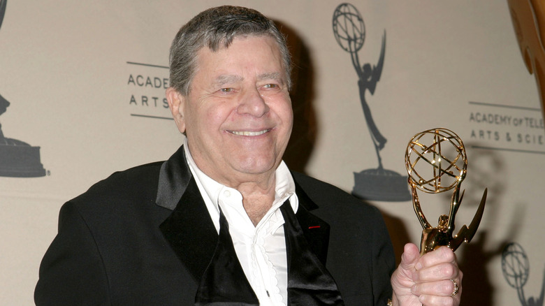 Jerry Lewis holding an Emmy 