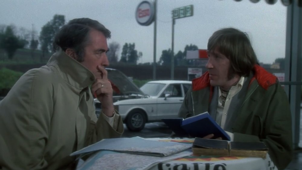 Gregory Peck and David Warner in The Omen