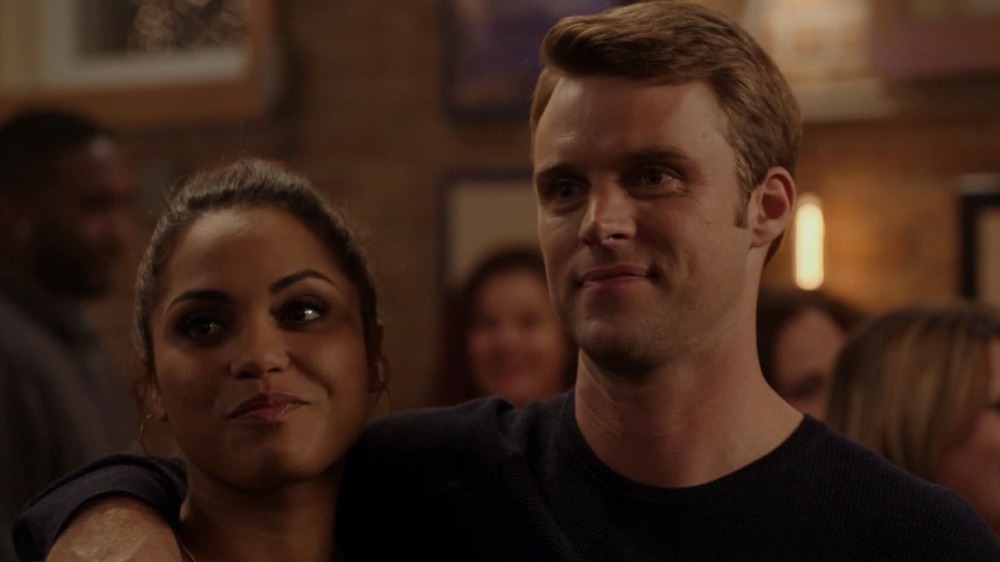 Monica Raymund and Jesse Spencer smiling