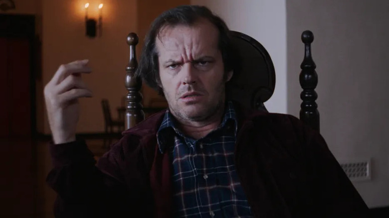 Jack Nicholson glares in chair