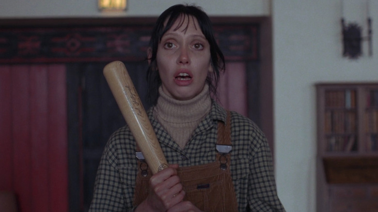 Shelley Duvall holds baseball bat