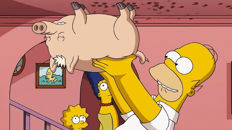 Homer whispers to Plopper the pig