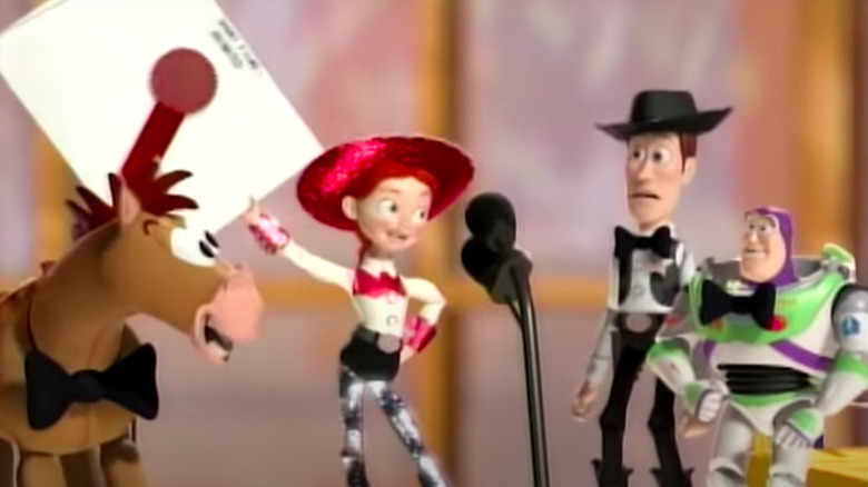 Toy Story characters present Oscar