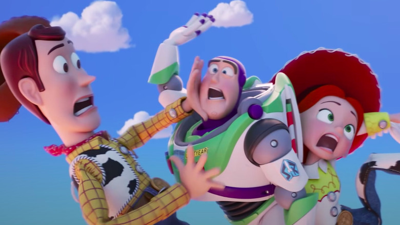 Woody, Buzz, and Jessie falling