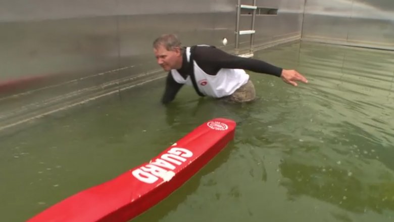 Turtleman wading through muck