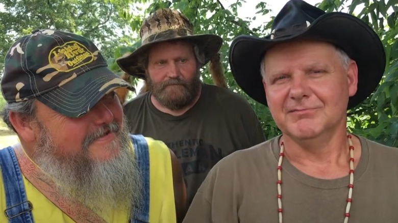 Turtleman standing with friends