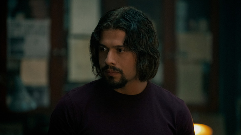 Diego with long hair and beard