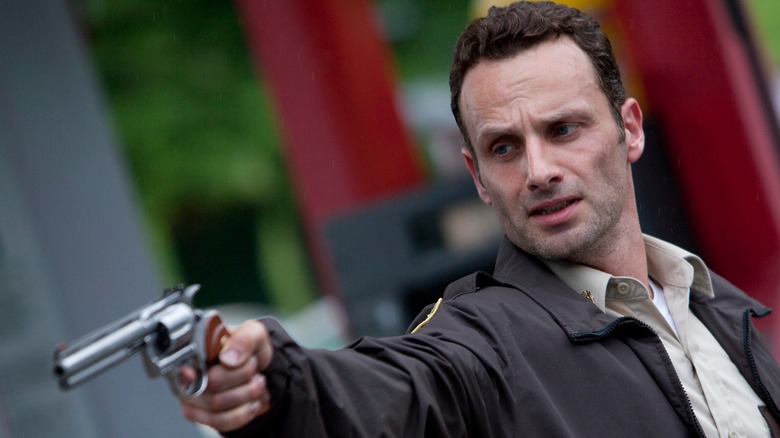 Andrew Lincoln with pistol