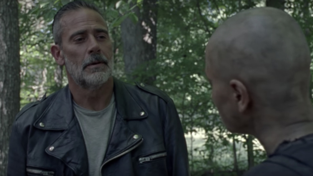 Negan looking at Alpha