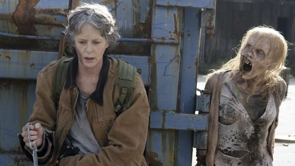 Carol hiding from walker