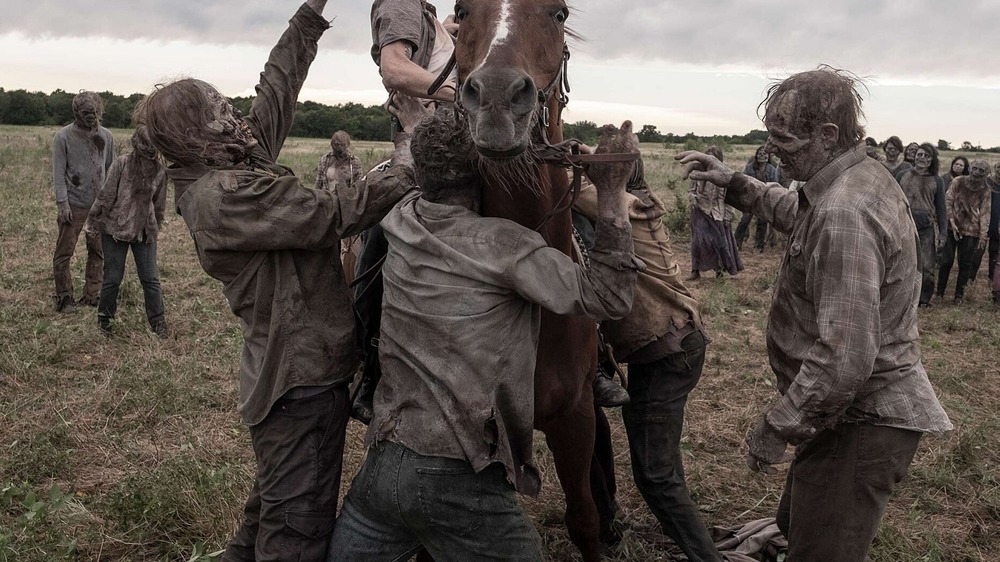 Walkers attacking horse