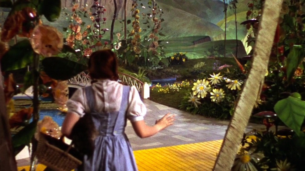 Dorothy opening door to OZ