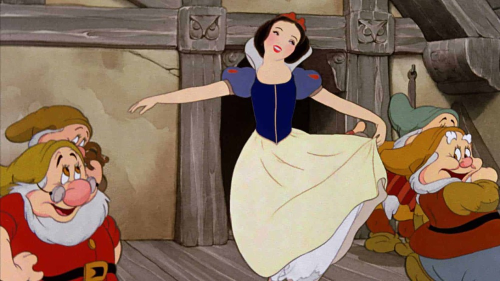 Snow White dancing with dwarfs