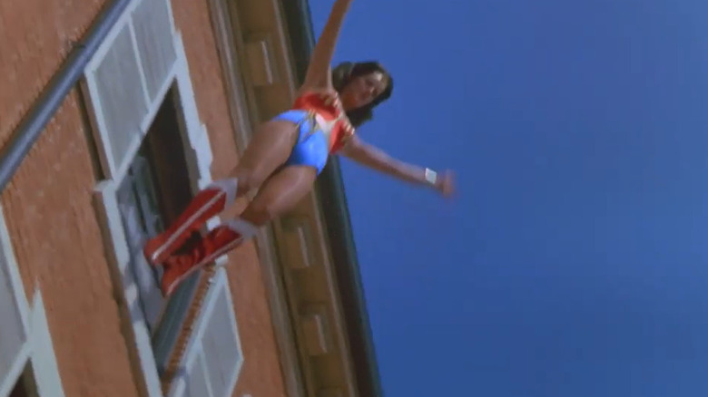 Wonder Woman jumps out building window