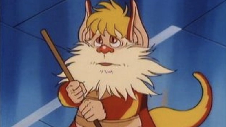 Snarf holding a broom