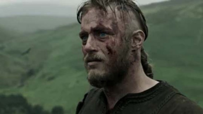 Ragnar stands in hills