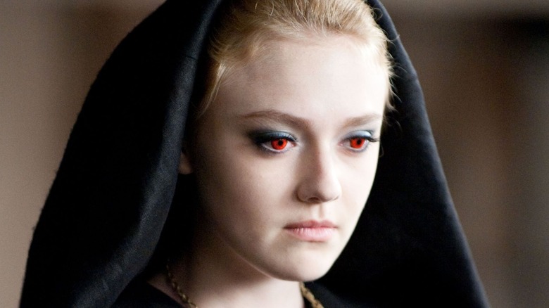 Jane in a black cloak with red eyes