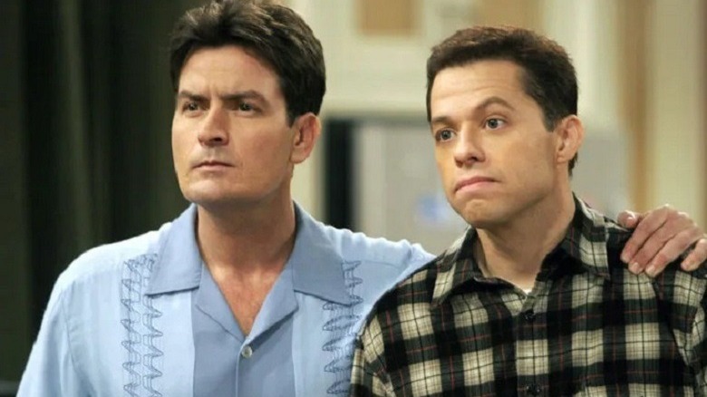 Charlie Harper with his arm around Alan