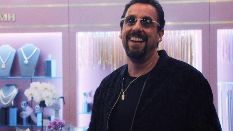 Howard grinning in jewelry store