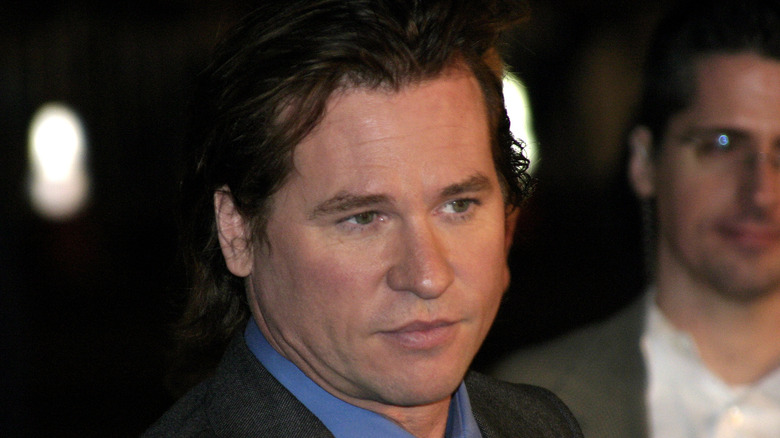 Val Kilmer looks into distance