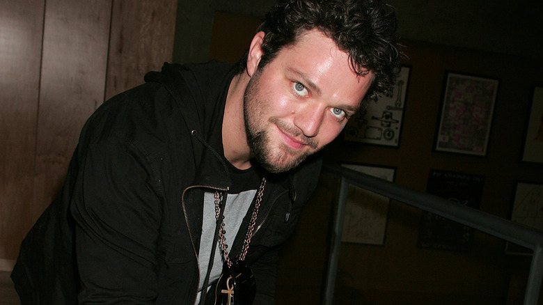 Bam Margera signing skateboard