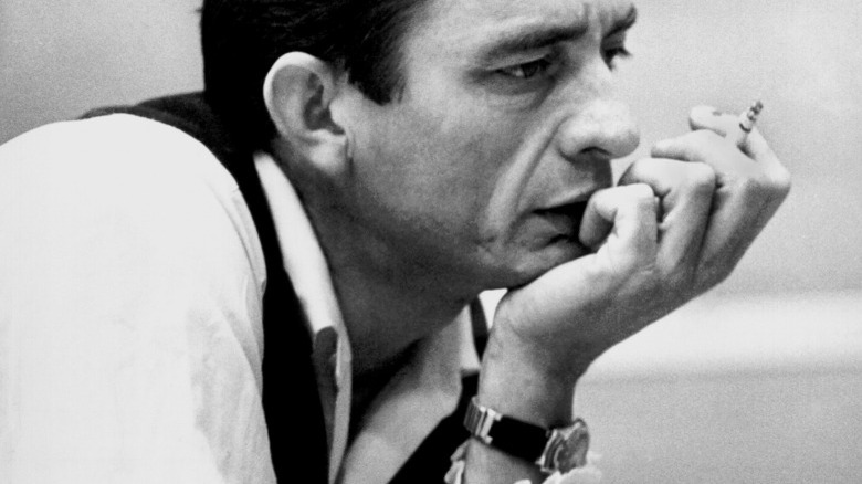 A young Johnny Cash contemplates