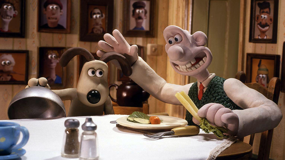 Wallace petting Gromit