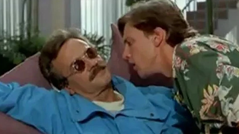 Terry Kiser and Andrew McCarthy in Weekend at Bernie's