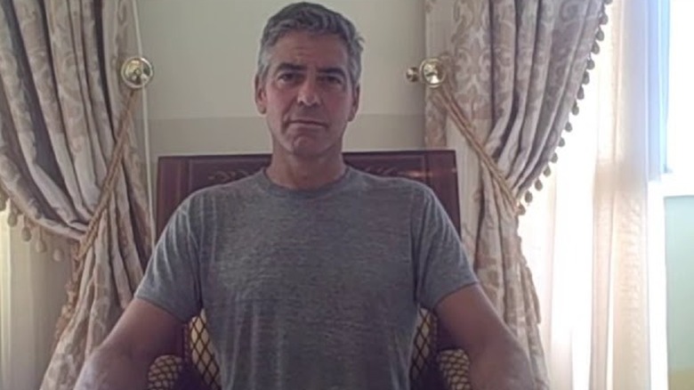 George Clooney in a gray shirt