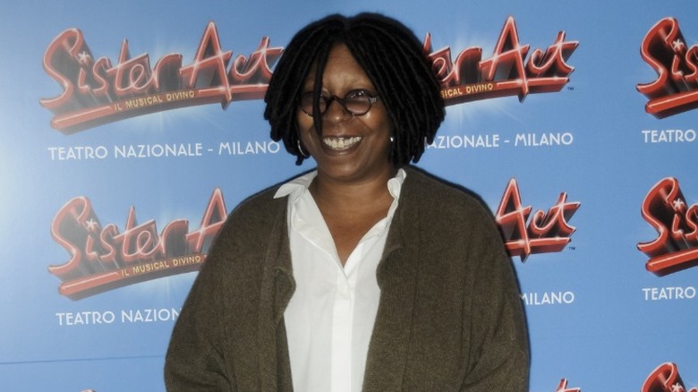 Whoopi Goldberg smiling at event