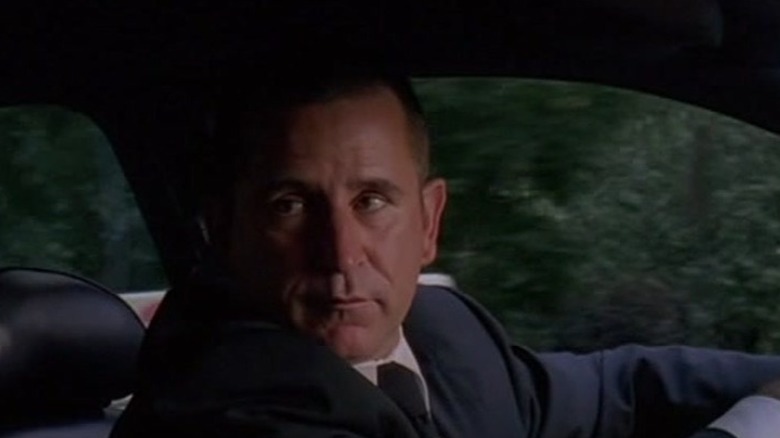 Anthony LaPaglia sitting in a car