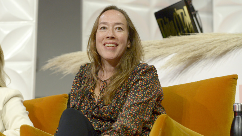 Karyn Kusama sitting on couch Yellowjackets