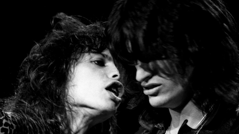 Steven Tyler and Joe Perry performing