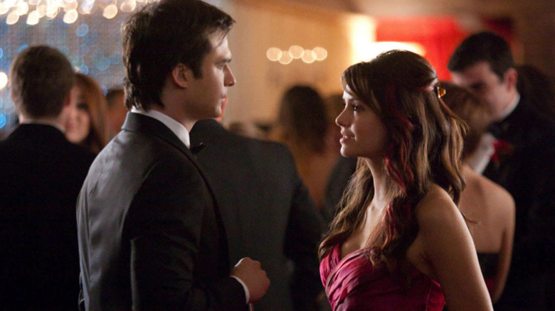 Damon with Elena at prom