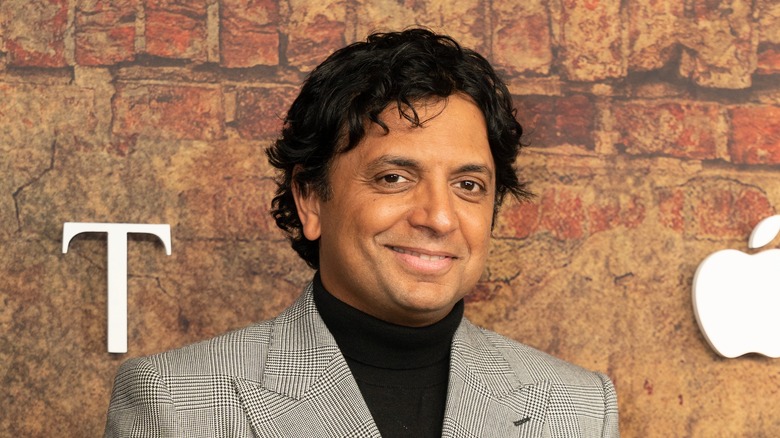 Smiling M. Night Shyamalan