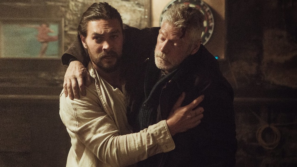 Jason Momoa carries Stephen Lang