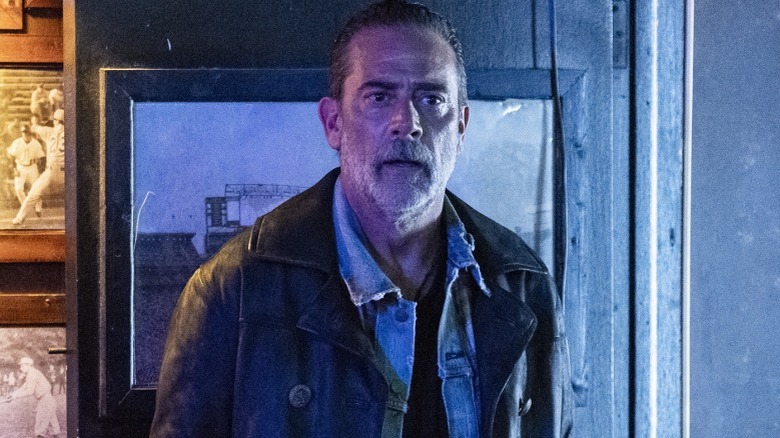 Negan standing in a doorway