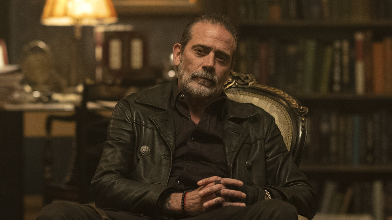 Negan wearing leather jacket