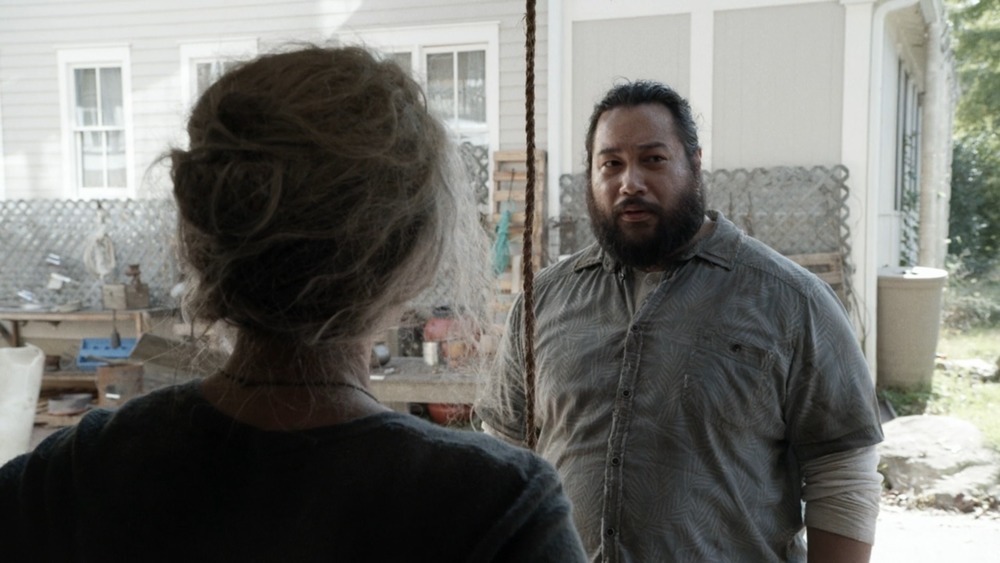 Jerry talking to Carol outside